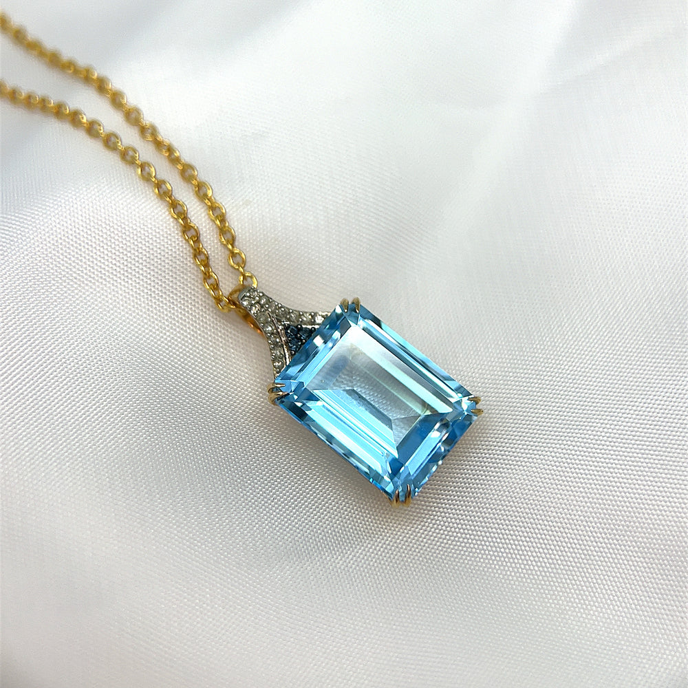 Sky Blue Topaz, Sapphire and Diamond Pendant