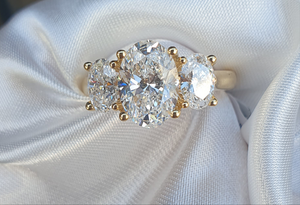 Lab grown diamond -Three stone oval ring. 1