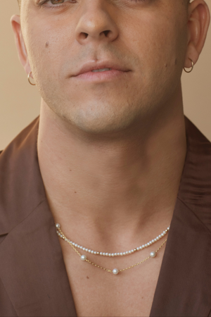 Hera-Gold and Pearl necklace.