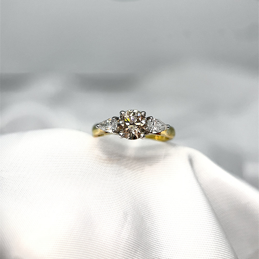 Argyle Champagne and Pear Shape Three Stone Diamond Ring