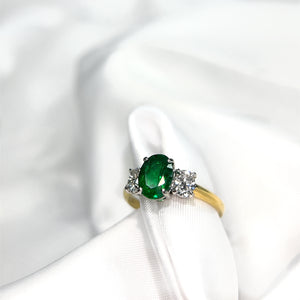 Oval Emerald and Diamond Three Stone Ring