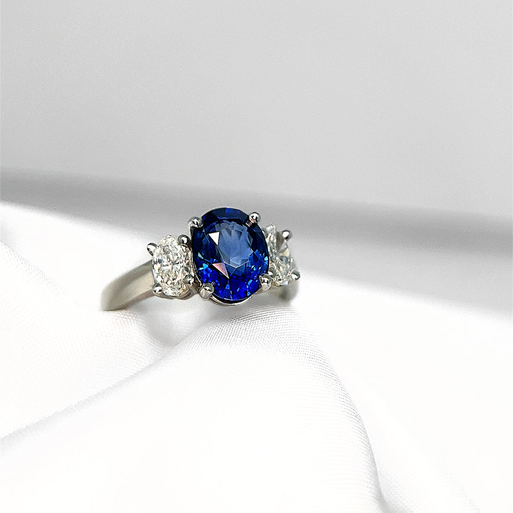 
            
                Load image into Gallery viewer, Oval Sapphire and Diamond Three Stone
            
        