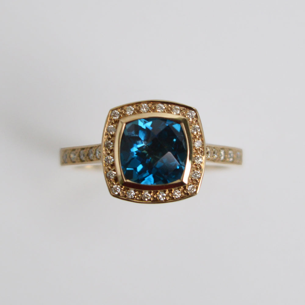 
            
                Load image into Gallery viewer, Blue Topaz &amp;amp; Diamond Halo Ring
            
        
