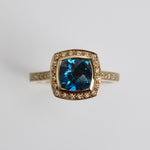 Blue Topaz & Diamond Halo Ring