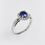 Sapphire & Diamond Halo Ring in Platinum