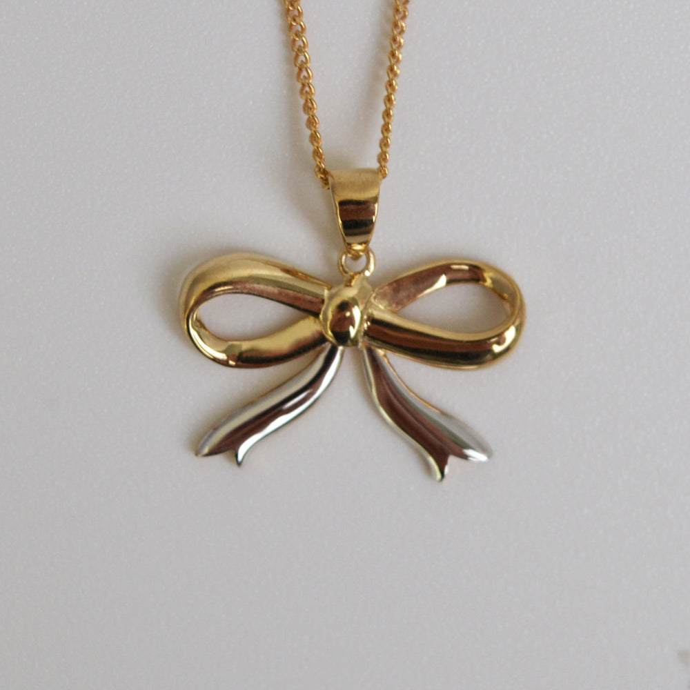 
            
                Load image into Gallery viewer, Bow Pendant in Yellow &amp;amp; White Gold
            
        